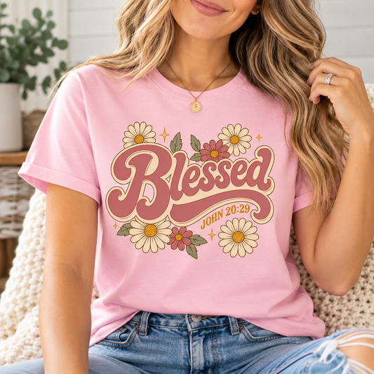 Pink Blessed Christian T-shirt featuring retro floral artwork and John 20:29 from the Journey Wear collection.