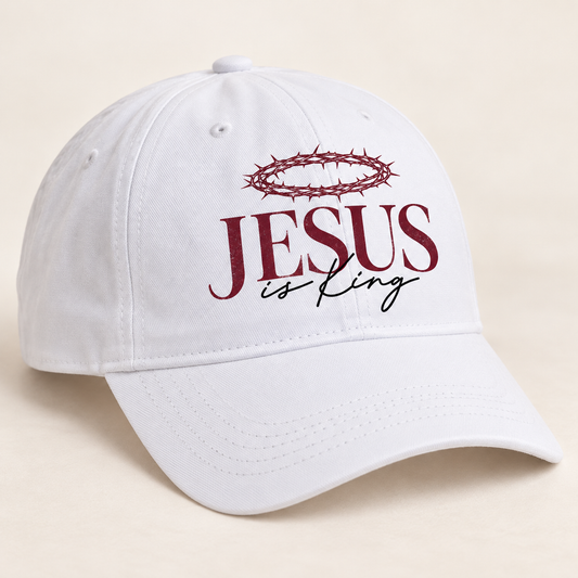 White ball cap with a curved brim featuring a burgundy crown of thorns above burgundy JESUS lettering and black is King script.