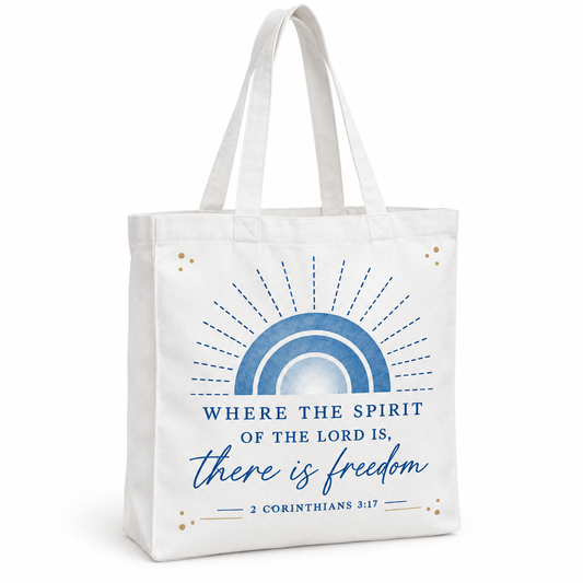White tote bag with long handles, blue rainbow arches, gold-colored accents, and Where the Spirit of the Lord Is There Is Freedom lettering.