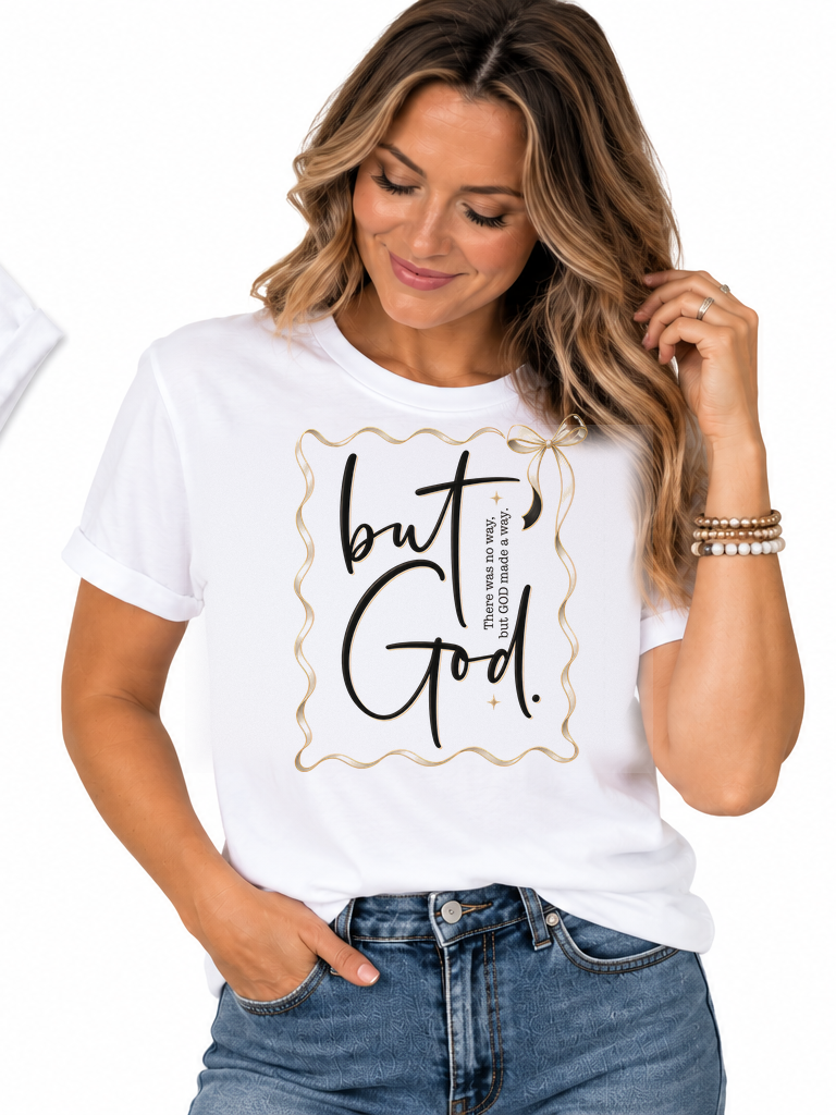 White Christian T-shirt featuring “But God” and “There was no way, but God made a way” in elegant black typography with delicate gold accents.